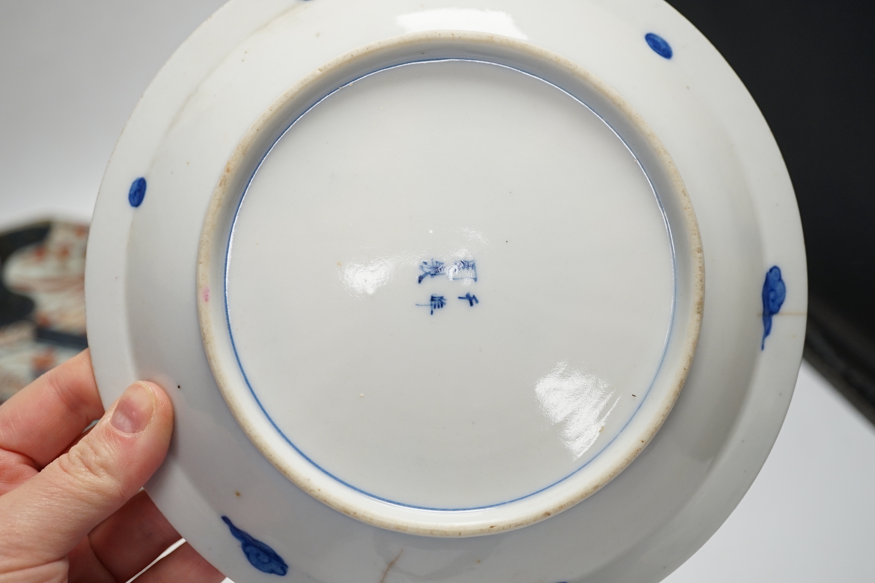 A late 17th/early 18th century Japanese Arita dish (a.f) and two other Arita pieces, largest 27cm